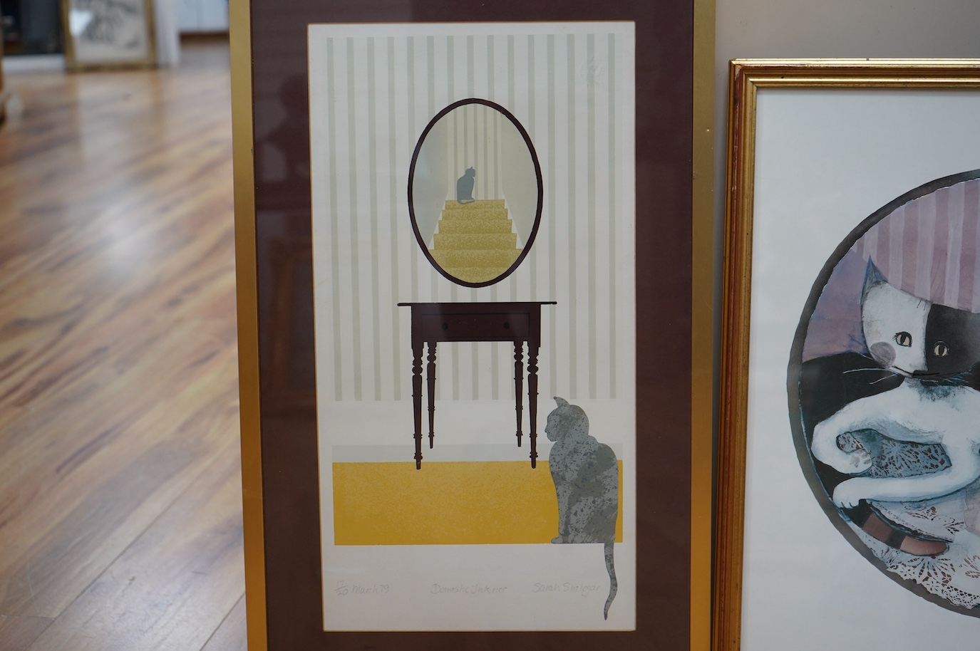 Rosina Wachtmeister (Austrian, b.1939), heightened lithograph of cats, signed in pencil, together with another by Sarah Snelgar, Domestic interior, limited edition 17/20, signed and dated March '79, largest 49 x 39cm. Co